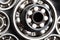 Machinery and technology industrial background. Group of various ball bearings close up