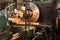 Machining the workpiece part on a lathe, parts are blurred in motion