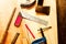 Machinist square , wood pencil, hammer, saw, clamp, Chisel, vise, tape measure, file for carpenter on wooden background tool wood