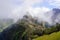 Machu Picchu city and mountains covered with clouds