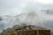 MACHU PICCHU, CUSCO REGION, PERU- JUNE 4, 2013: Panoramic view of the 15th-century Inca citadel Machu Picchu