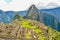 MACHU PICCHU, CUSCO REGION, PERU- JUNE 4, 2013: Panoramic view of the 15th-century Inca citadel Machu Picchu