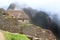 Machu Picchu\'s house and cloudy mountains