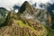 Machu Picchu with scattered cloud cover and sunshine
