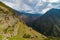 Machu Picchu terraces steep view from above to Urubamba valley below. Peru travel destination, tourism famous place.