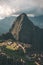 Machu Picchu terraces steep view from above to Urubamba valley below. Peru travel destination, tourism famous place.