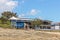 Mackay, Queensland, Australia - October 2019: Surf lifesaving lifeguard lookout in front of the club house amongst the sand dunes