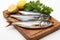 Mackerel on cutting board isolated against a white backdrop, capturing freshness.