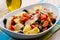 Mackerels with potatoes,tomatoes,c apers and olives