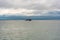 Mackinaw Island, MI - July 14, 2021: Shepler's Ferry passing the jetty at Mackinaw Island, MI on July 14, 2021.