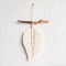 Macrame leaf wall hanging in natural color on the wooden stick. Cotton rope decor macrame to make your room more cozy and unique.