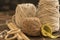 MacramÃ© still life - group of cords and threads with scissors and measure tape including wood elements to handcraft macrame home