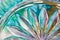Macro abstract art background of beautiful lead crystal glass reflecting brilliant turquoise color