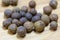 Macro allspice on wooden background