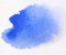 Macro blue watercolor splash, isolated on white background