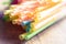 Macro Of A Bunch Colored Drinking Straws On A Wooden Table