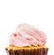 Macro close up of a cupcake with pink cream and white sugar isolated on white background, File contains a clipping path