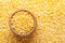 Macro Close-up of Organic yellow Gram Vigna radiata or split yellow moong dal in an earthen clay pot kulhar