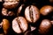 Macro close up of pile of roasted brown coffee beans in natural sunlight showing details of surface