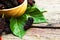 Macro close up of single mulberry fruits on wood table