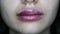 Macro close-up of swollen lips after injections of hyaluron, lip augmentation