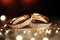 Macro close up of two perfect wedding rings with amazing ivory diamonds in a jewelry shop.