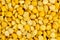 Macro closeup background texture of yellow split peas