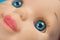 Macro closeup of doll blue eye selective focus