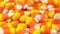 Macro closeup of Halloween traditional Candy Corn treats.