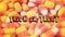 Macro closeup of Halloween traditional Candy Corn treats retro filter with text.