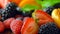 Macro closeup of rotating mixed summer fruit on wooden table.