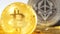 Macro Coin Belonging to Bitcoin in front of Model of Ethereum