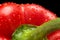 Macro cut shot of red bell pepper background with water drops