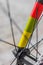 Macro detail of a coloured fixie bike fork