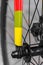Macro detail of a coloured fixie bike fork