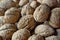 Macro detail of a heap of nuts walnuts as a symbol of healthy snack and organic food