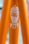 Macro detail of orange tube with sticker on a fixie bike