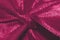 Macro detail of raspberry sorbet Christmas ribbon bow