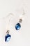 Macro of earrings blue and white