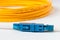 Macro Fiber optic patchcord on white background