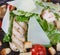 Macro fragment of salad with grilled chicken meat,