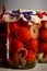 macro glass jar with homemade canned tomatoes