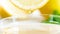 Macro image of juice droplet on side of fresh lemon slice
