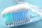 Macro image of toothpaste on a toothbrush. Tooth care concept.