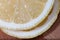 Macro lemon slices on the cutting board