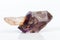 Macro mineral stone Amethyst on smoky quartz on a white background