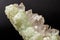 Macro mineral stone Prehnite quartz on a black background