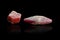 Macro mineral stone ruby on a black background background