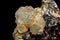 Macro of a mineral stone Sphalerite with fluorite and pyrite on a black background