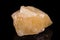 Macro mineral stone yellow calcite on white background